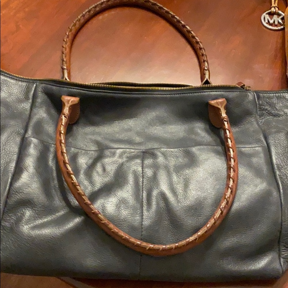 Sundance leather purse in GUC.